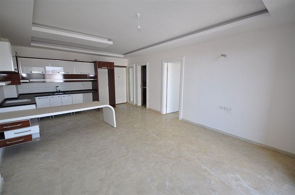 Квартира 1+1 в Махмутларе без мебели