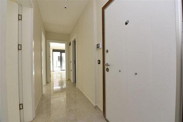 Небольшая квартира 2+1 в Махмутлар - 1-ый этаж