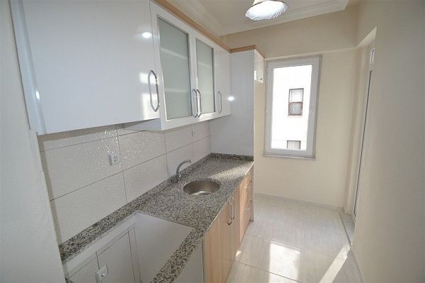 Алания: недорогая квартира 1+1 в Махмутлар (№515)